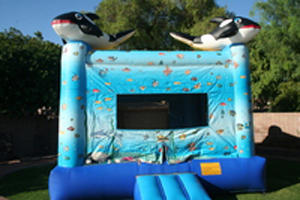 Orca on top of the bounce house
